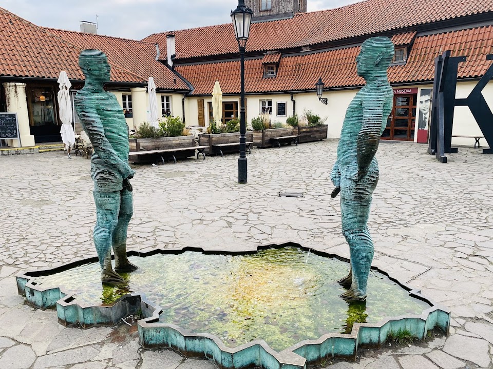 Peeing Characters Sculpture